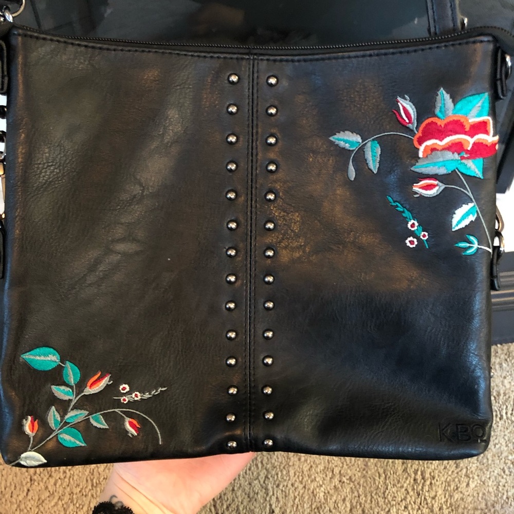 Embroidered crossbody and clutch in one